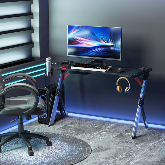 Gamer's Battle Station - LED Illuminated Carbon Fiber-Style Workstation with Cup Holder, Headphone Hook & Storage Basket - Sleek Steel Frame for Enhanced Gaming Experience