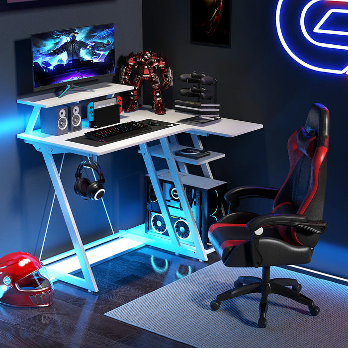 Gaming Station Desk - L-Shaped Design with Utility Monitor Shelf and Integrated USB Ports and Outlets - Ideal for Gamers and Multi-Monitor Setups