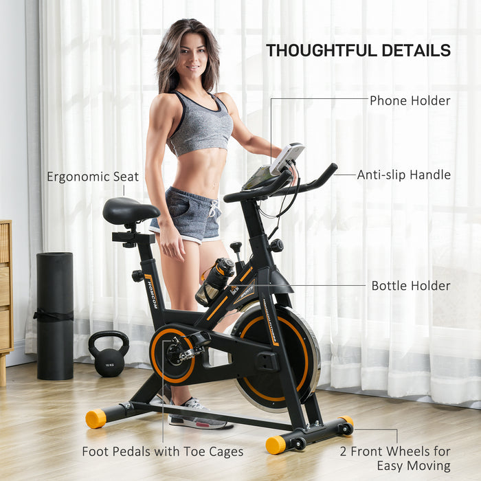 Indoor Cycling Exercise Bike with LCD & Heart Rate Sensor - Orange Static Bike for Cardio Workouts at Home or Office - Ideal for Fitness Enthusiasts and Everyday Gym-goers