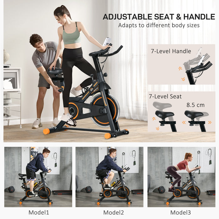 Indoor Cycling Exercise Bike with LCD & Heart Rate Sensor - Orange Static Bike for Cardio Workouts at Home or Office - Ideal for Fitness Enthusiasts and Everyday Gym-goers