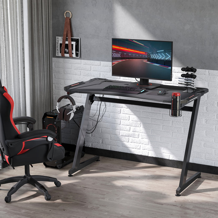 Ergonomic Gaming Desk - Home Office Workstation with Headphone Hook and Cup Holder, 122 x 66 x 86cm - Ideal for Gamers and Streamers, Black