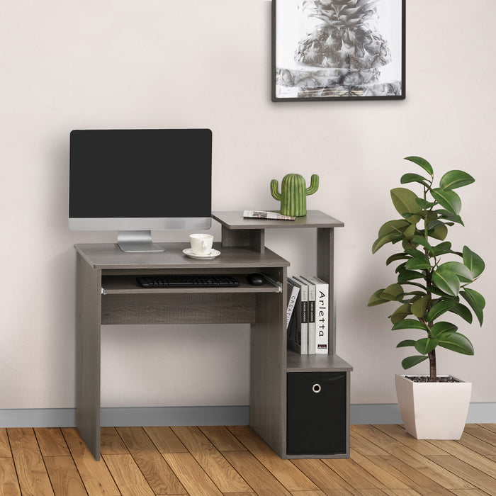 Compact Grey Computer Desk with Sliding Keyboard Tray - Home Office Workstation with Storage Drawer and Shelf - Ideal for Working, Gaming, Studying