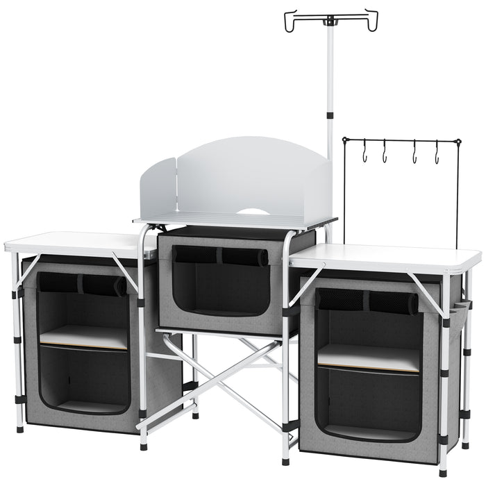 Portable Aluminum Camping Kitchen Station - Foldable Table with 3 Fabric Storage Cupboards, Windshield, Light Holder - Ideal for BBQ, RV Trips, and Outdoor Picnics