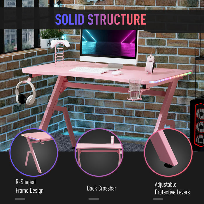 Ergonomic Racing Gaming Desk with RGB LED Lighting - Pink Home Office Computer Workstation with Controller Rack and Cable Management - Designed for Gamers and Streamlined Workspace