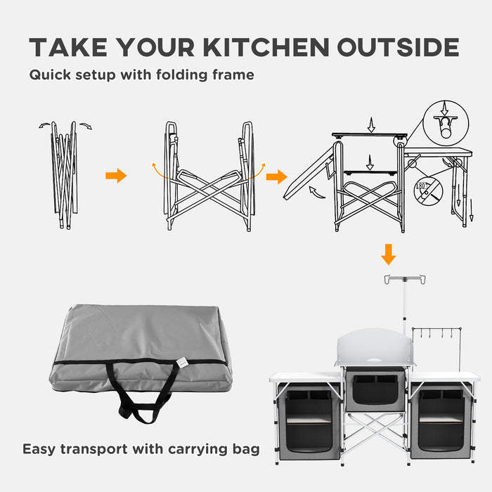 Portable Aluminum Camping Kitchen Station - Foldable Table with 3 Fabric Storage Cupboards, Windshield, Light Holder - Ideal for BBQ, RV Trips, and Outdoor Picnics